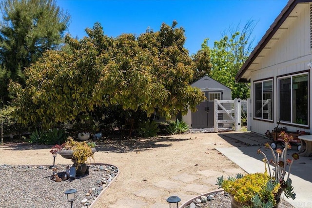 view of yard with a gate and fence
