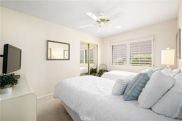 77178 Pauma Valley Way, Palm Desert, CA 92211 - carpeted bedroom with a closet, baseboards, and a ceiling fan