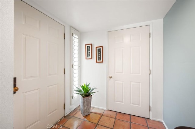 77178 Pauma Valley Way, Palm Desert, CA 92211 - entrance foyer with baseboards and light tile patterned floors