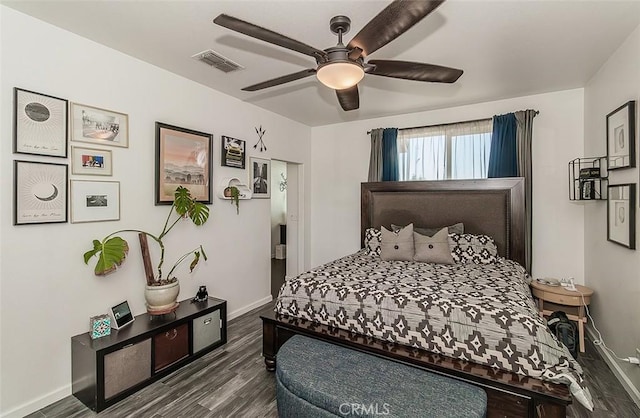 7005 N Astoria Dr, Fresno, CA 93722 - bedroom featuring wood finished floors, baseboards, and a ceiling fan