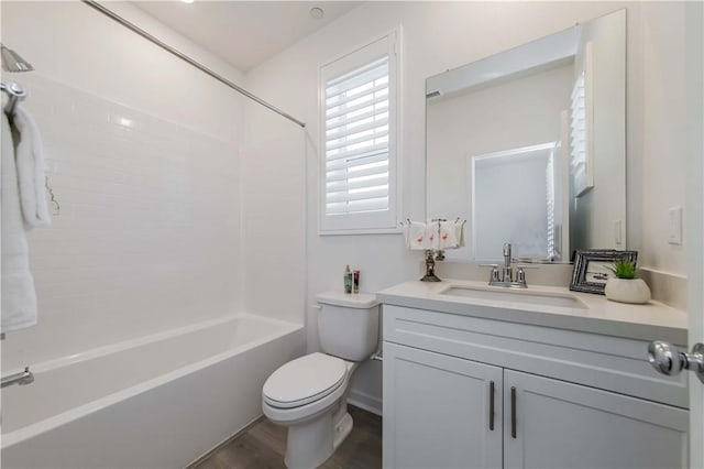 16436 Whittier Blvd Unit 1, Whittier, CA 90603 - bathroom featuring toilet, vanity, bathtub / shower combination, and wood finished floors