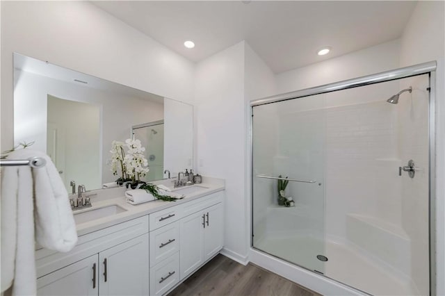 16436 Whittier Blvd Unit 1, Whittier, CA 90603 - bathroom with a stall shower, double vanity, and wood finished floors