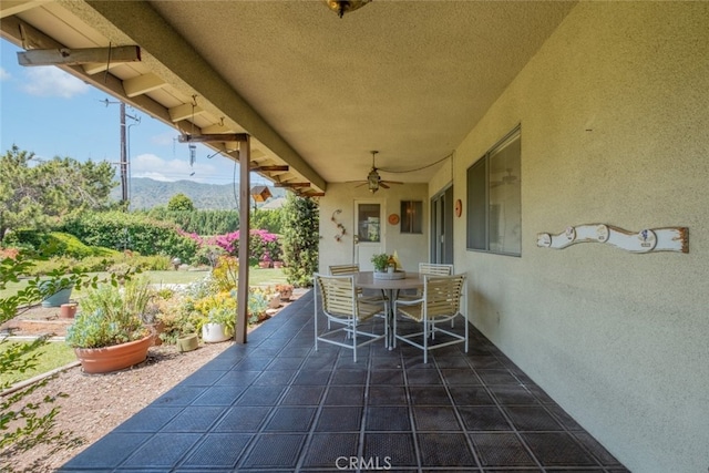 655 Fountain Springs Ln, Glendora, CA 91741 - view of patio with outdoor dining area, ceiling fan, and a mountain view