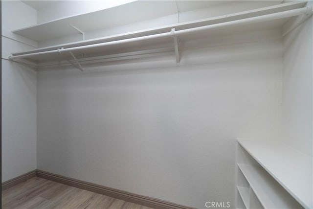 8140 Weirick Rd, Corona, CA 92883 - spacious closet with wood finished floors