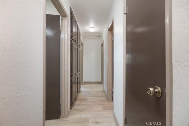 8140 Weirick Rd, Corona, CA 92883 - hallway with a textured wall and light wood-style flooring