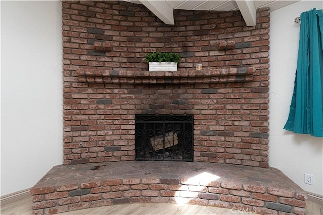 8140 Weirick Rd, Corona, CA 92883 - detailed view of a brick fireplace and wood finished floors