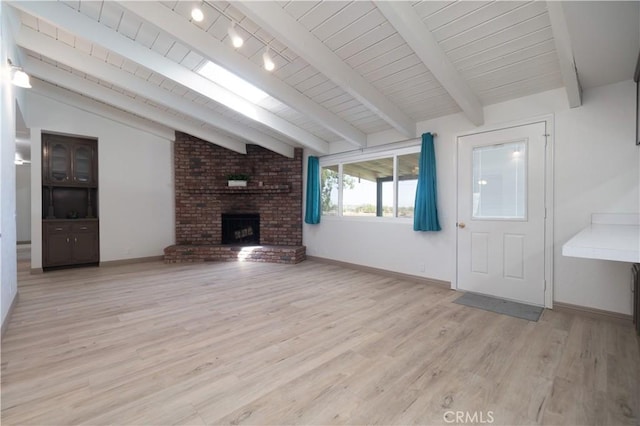 8140 Weirick Rd, Corona, CA 92883 - unfurnished living room featuring light wood-type flooring, a brick fireplace, and baseboards