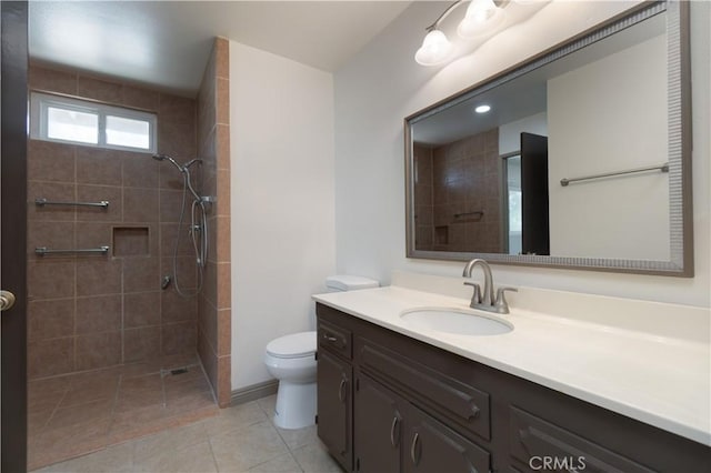 8140 Weirick Rd, Corona, CA 92883 - full bathroom featuring toilet, vanity, tiled shower, and tile patterned flooring