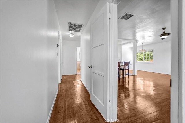 6225 Langdon Ave, Van Nuys, CA 91411 - corridor featuring wood finished floors and baseboards