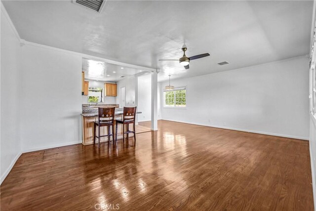 6225 Langdon Ave, Van Nuys, CA 91411 - living area with ceiling fan, wood finished floors, and baseboards