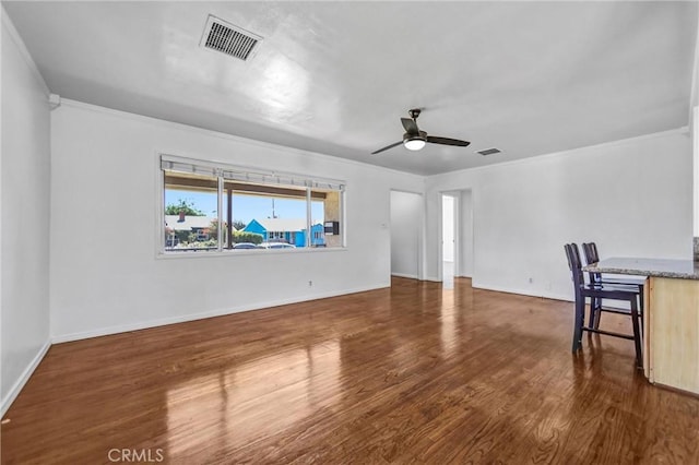 6225 Langdon Ave, Van Nuys, CA 91411 - spare room with ceiling fan, wood finished floors, crown molding, and baseboards