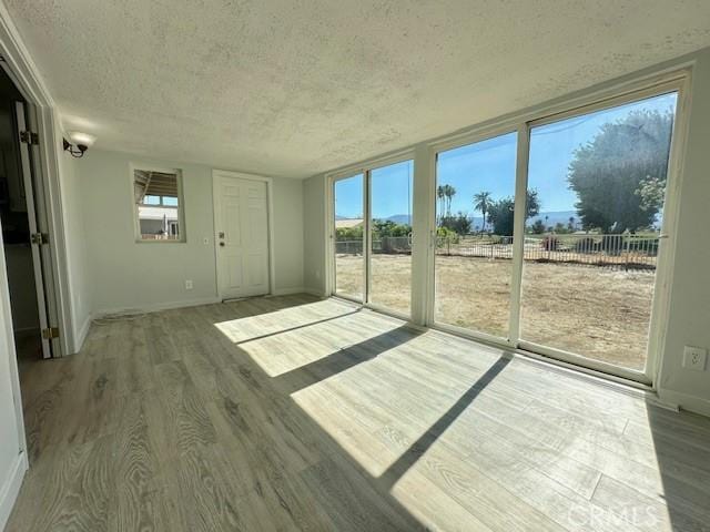 42815 Warner Trl, Palm Desert, CA 92211 - unfurnished sunroom with healthy amount of natural light