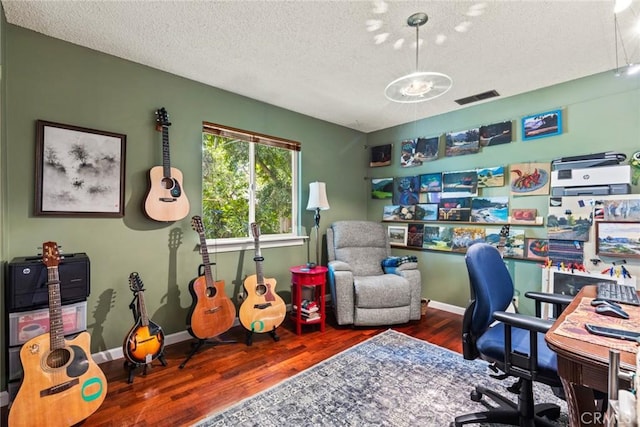 3123 Michael Way, Chico, CA 95973 - office area featuring wood finished floors, a textured ceiling, and baseboards