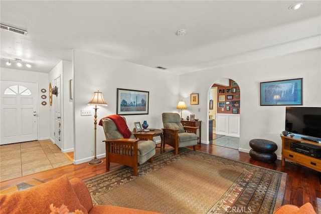 3123 Michael Way, Chico, CA 95973 - living room featuring arched walkways and wood finished floors