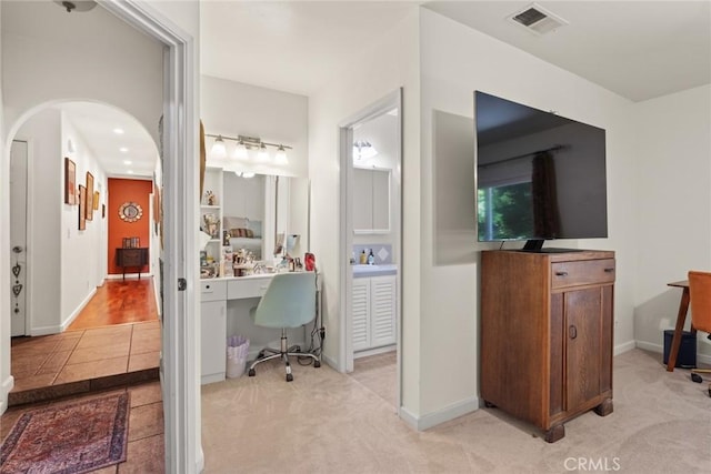 3123 Michael Way, Chico, CA 95973 - office area featuring arched walkways, light colored carpet, and baseboards