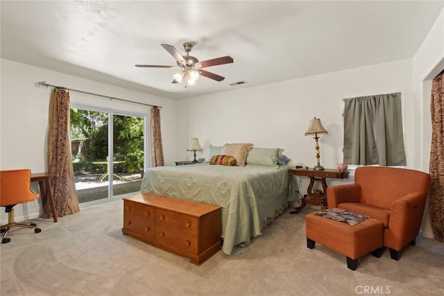 3123 Michael Way, Chico, CA 95973 - bedroom featuring access to exterior, light carpet, and a ceiling fan