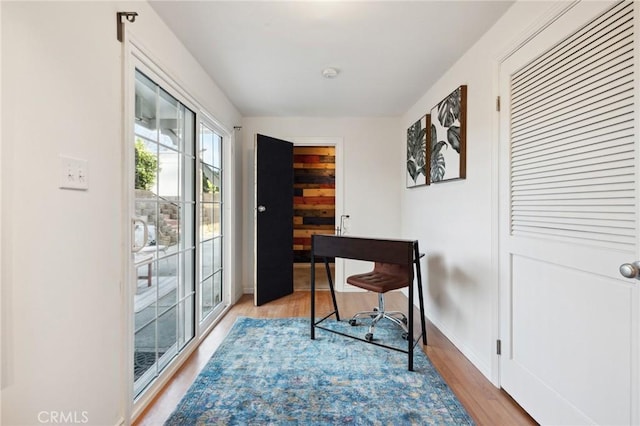 10708 Sable Ave, Sunland, CA 91040 - office area featuring light wood-style floors and baseboards