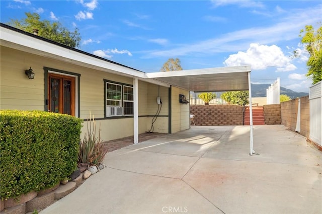 10708 Sable Ave, Sunland, CA 91040 - view of patio / terrace with fence, an attached carport, and cooling unit