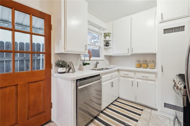 10708 Sable Ave, Sunland, CA 91040 - kitchen with stainless steel appliances, a sink, light countertops, open shelves, and white cabinets