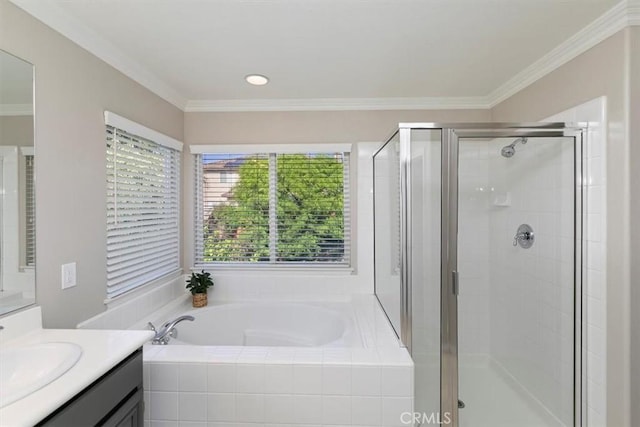 full bath with a stall shower, a bath, vanity, and ornamental molding