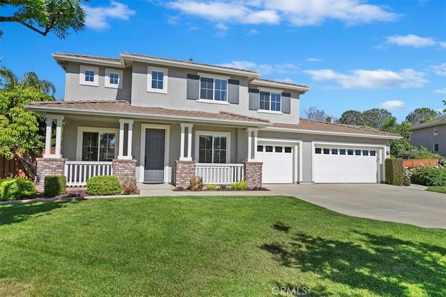view of front facade with covered porch, driveway, and stucco siding