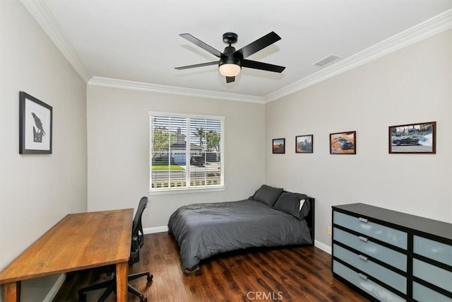 bedroom featuring crown molding, wood finished floors, baseboards, and ceiling fan