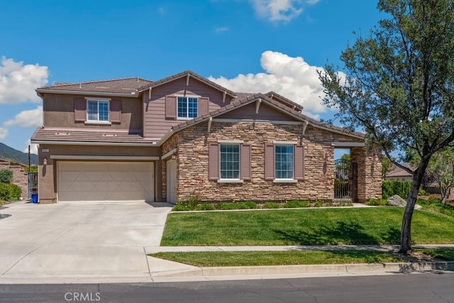 craftsman house featuring stone siding, an attached garage, concrete driveway, a tile roof, and a front yard
