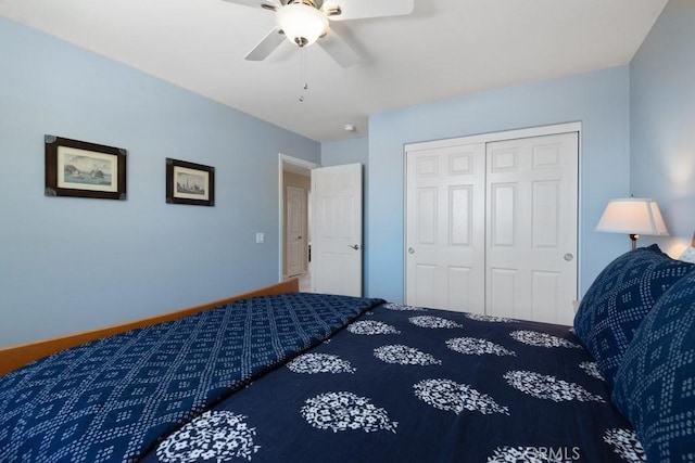 bedroom with a closet and a ceiling fan