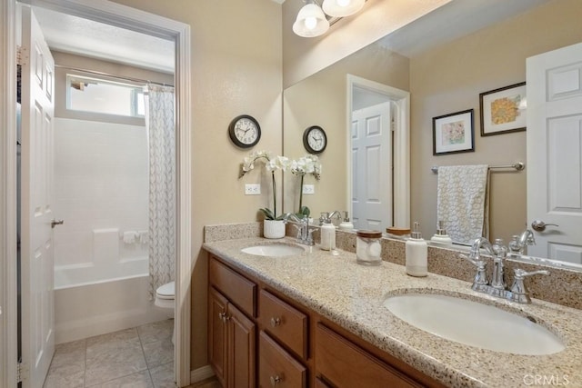 bathroom with toilet, double vanity, tile patterned flooring, and shower / bath combo
