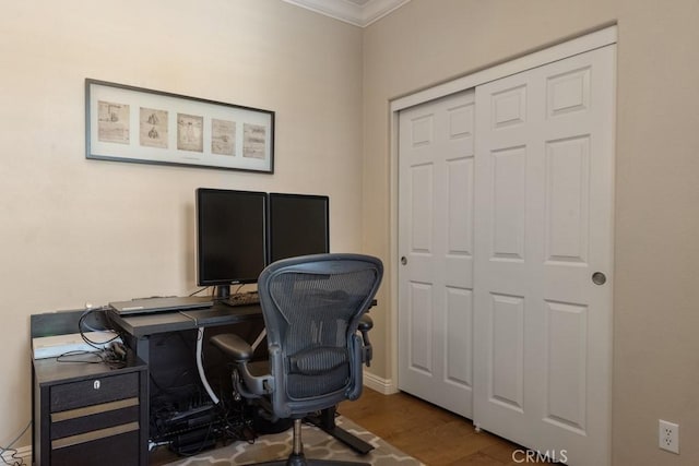 office with ornamental molding, wood finished floors, and baseboards