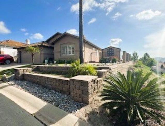 2307 Columbine Dr, Alpine, CA 91901 - view of front of house featuring an attached garage and driveway