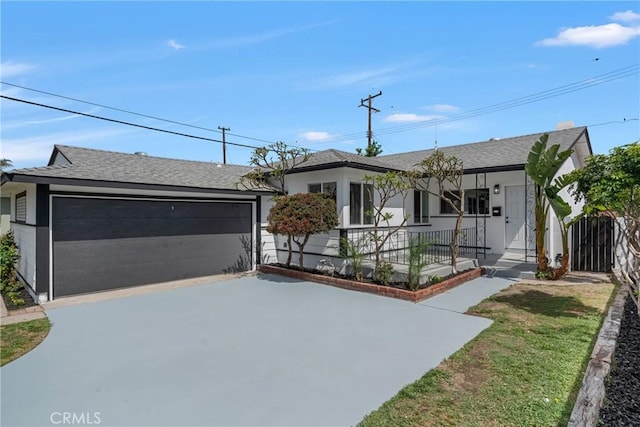 12815 Rexton St, Norwalk, CA 90650 - ranch-style house featuring stucco siding, covered porch, a garage, and a shingled roof