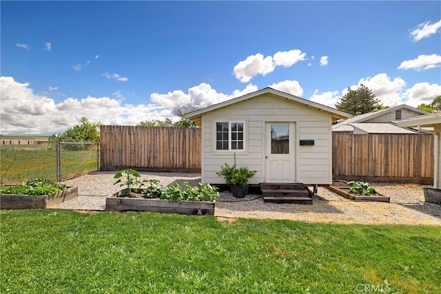 20 Parkhurst St, Chico, CA 95928 - view of outbuilding featuring a garden and an outbuilding
