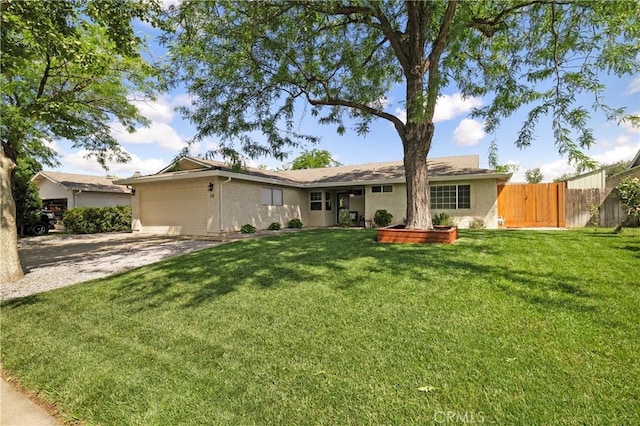 20 Parkhurst St, Chico, CA 95928 - ranch-style home with an attached garage, driveway, and stucco siding