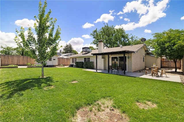 20 Parkhurst St, Chico, CA 95928 - rear view of property with a patio and a chimney