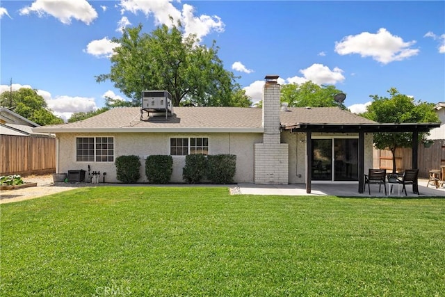 20 Parkhurst St, Chico, CA 95928 - back of house featuring central air condition unit, a patio, stucco siding, and a shingled roof