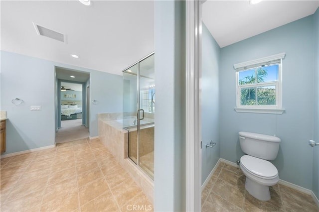 full bathroom with a stall shower, toilet, vanity, baseboards, and recessed lighting