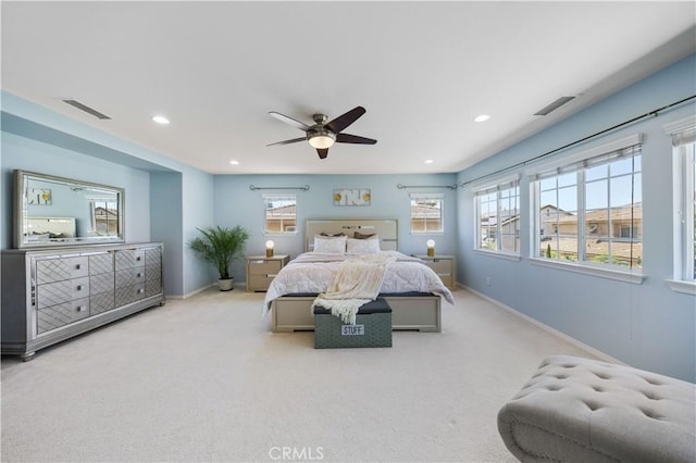 carpeted bedroom with recessed lighting, baseboards, and a ceiling fan