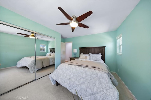 bedroom with carpet, baseboards, and ceiling fan