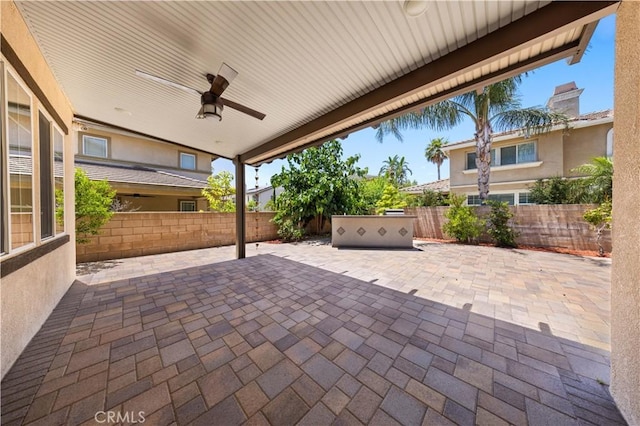 view of patio / terrace with ceiling fan and a fenced backyard