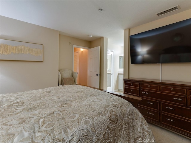 bedroom with ensuite bathroom