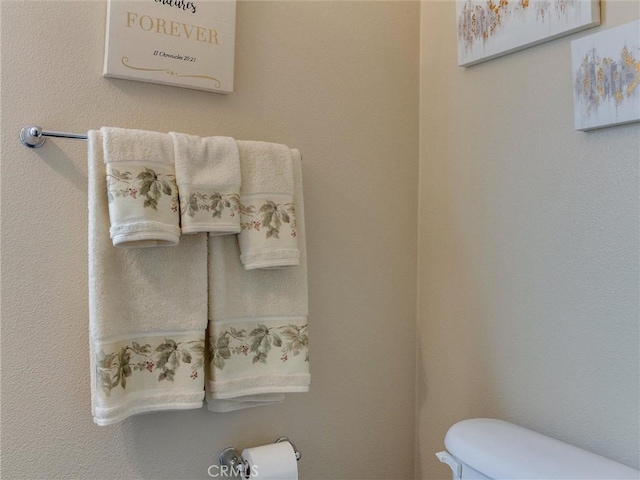 half bathroom with toilet