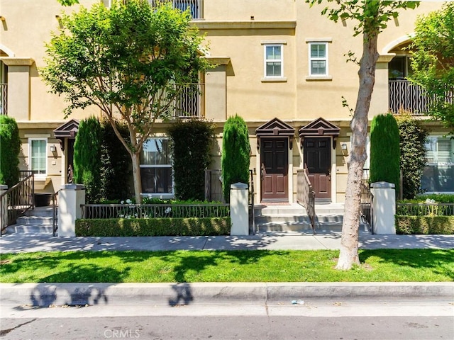 view of property with stucco siding