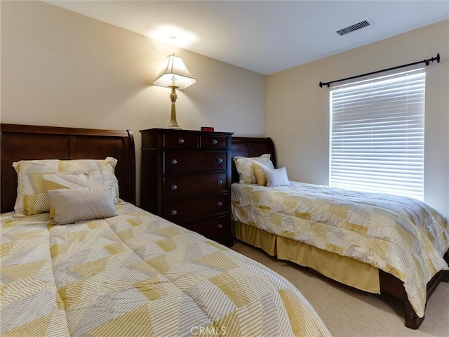 bedroom featuring carpet flooring
