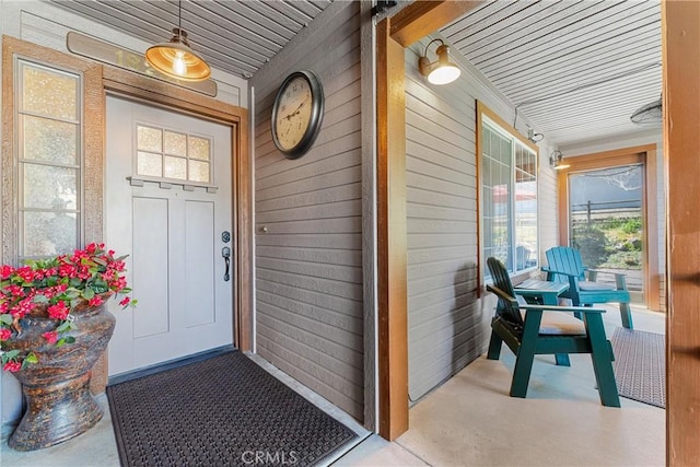 doorway to property with a porch