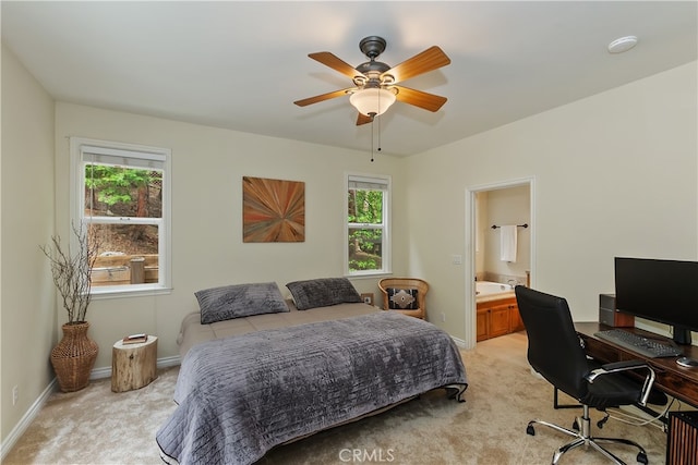 28589 Shenandoah Dr, Lake Arrowhead, CA 92352 - bedroom featuring light carpet, an office area, connected bathroom, baseboards, and ceiling fan