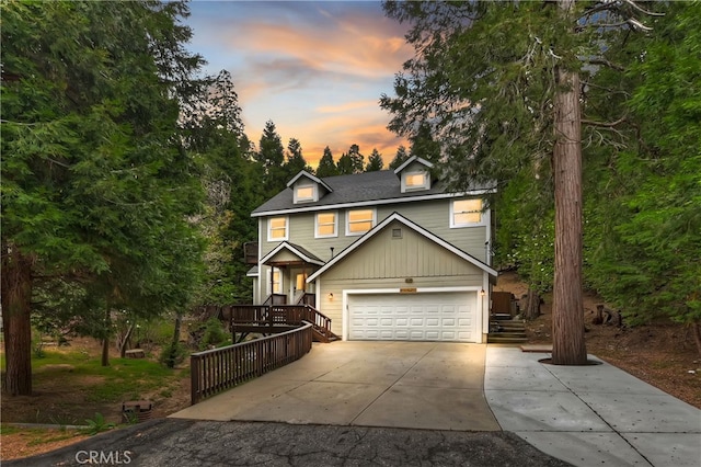 28589 Shenandoah Dr, Lake Arrowhead, CA 92352 - view of front of house with driveway and a garage