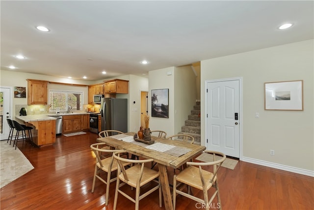 28589 Shenandoah Dr, Lake Arrowhead, CA 92352 - dining area featuring dark wood finished floors, stairs, recessed lighting, and baseboards