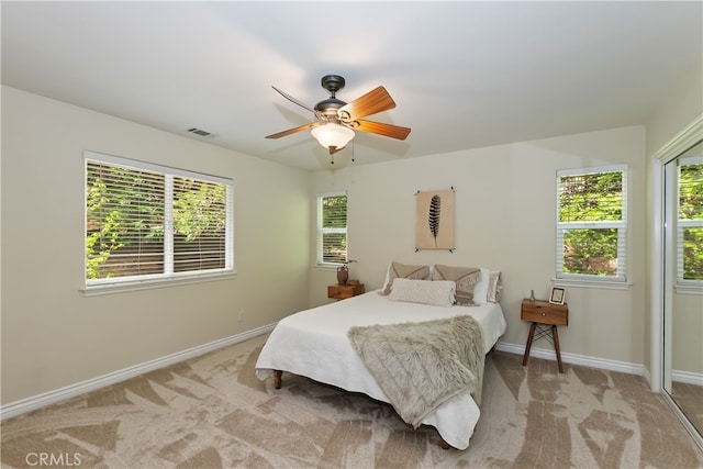 28589 Shenandoah Dr, Lake Arrowhead, CA 92352 - bedroom featuring light colored carpet, multiple windows, and baseboards