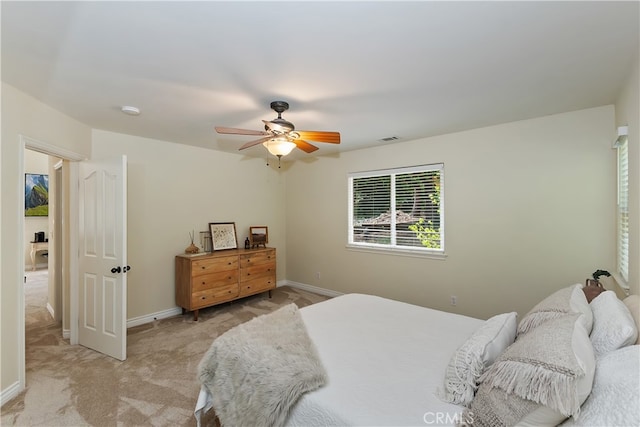 28589 Shenandoah Dr, Lake Arrowhead, CA 92352 - bedroom with light carpet, baseboards, and ceiling fan